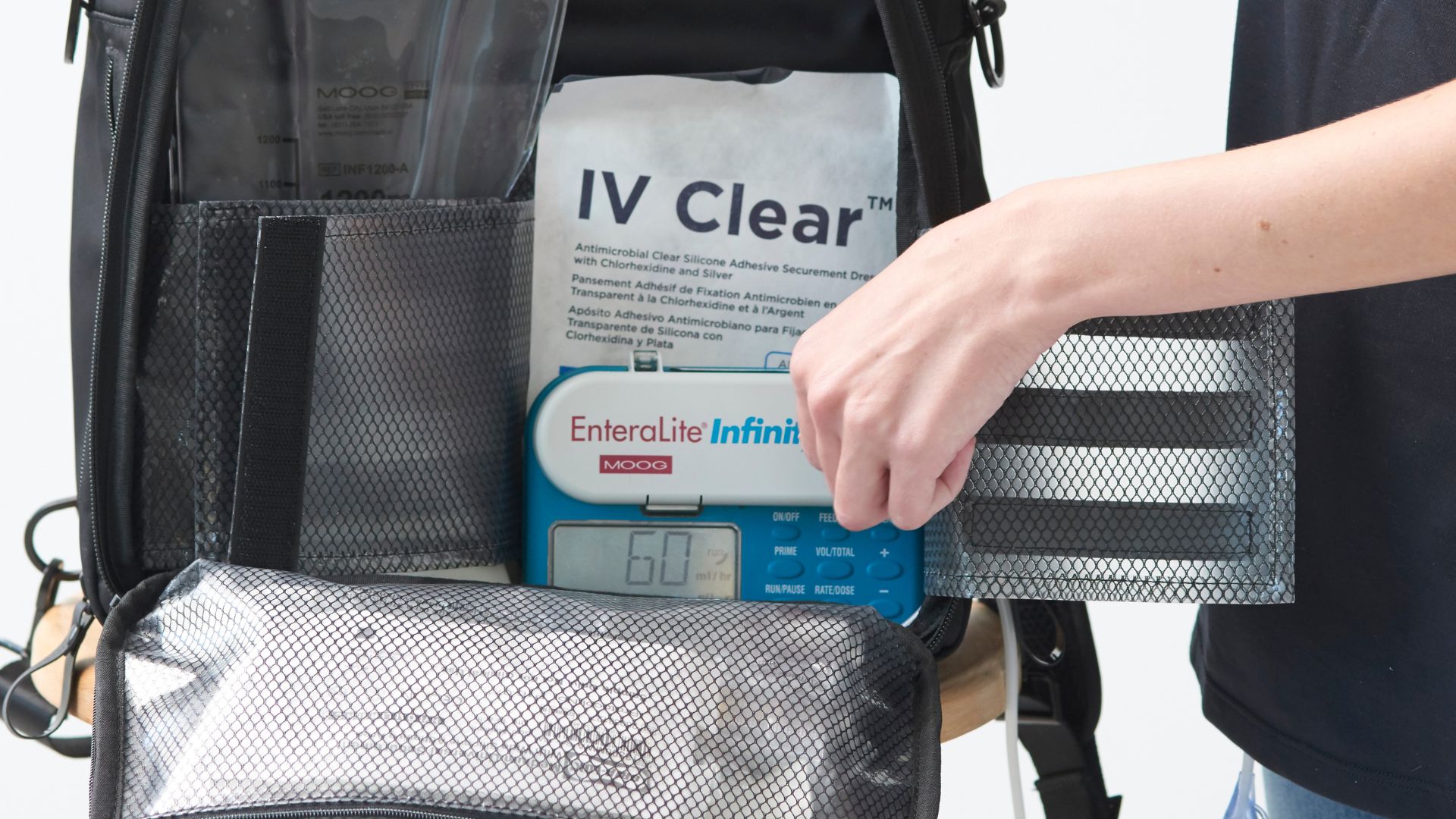 Enteral feeding Infinity Pump in Mighty Well Backpack - Fluid Motion Backpack